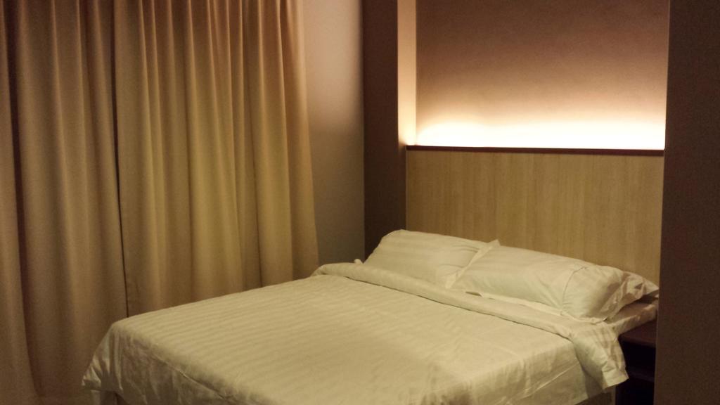 Tribeca Suites Kuching Quarto foto